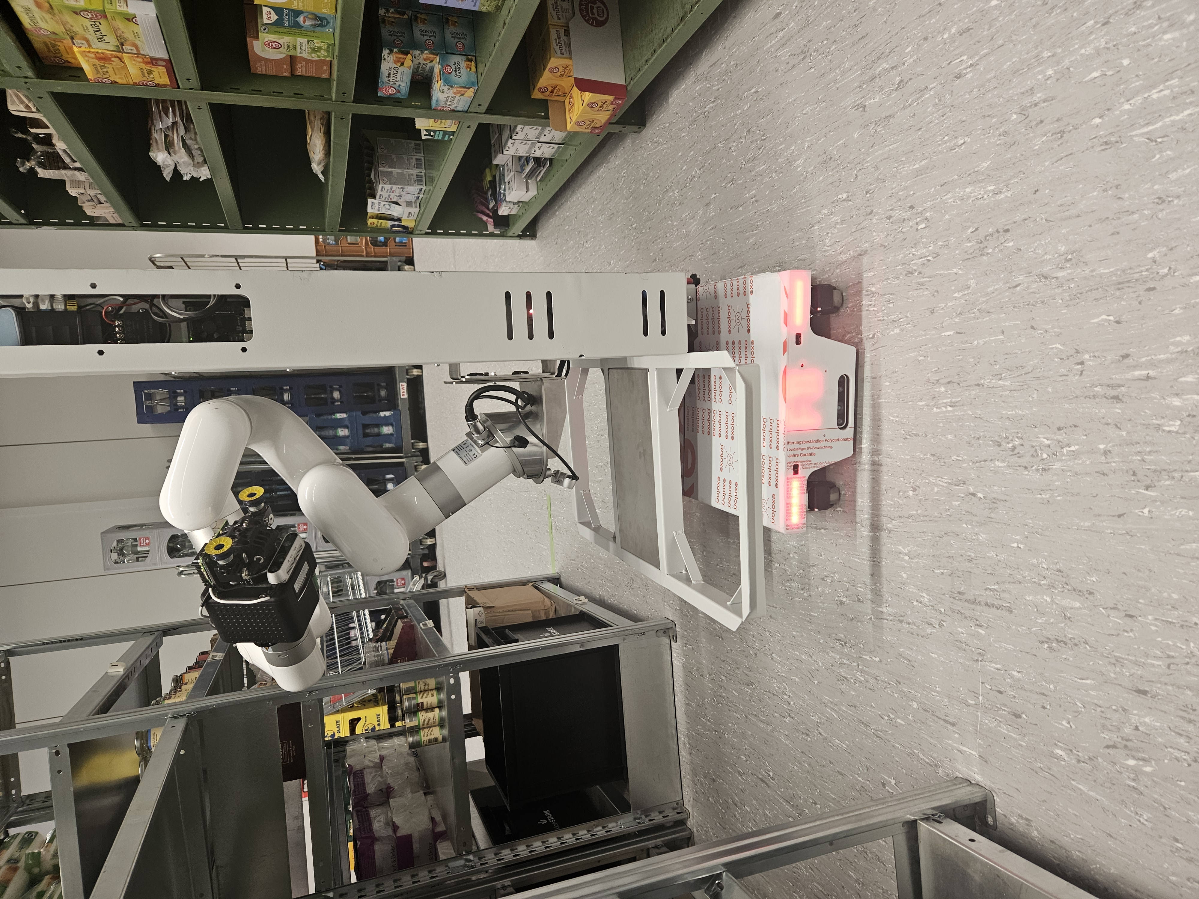 Mobile manipulator working in a retail aisle